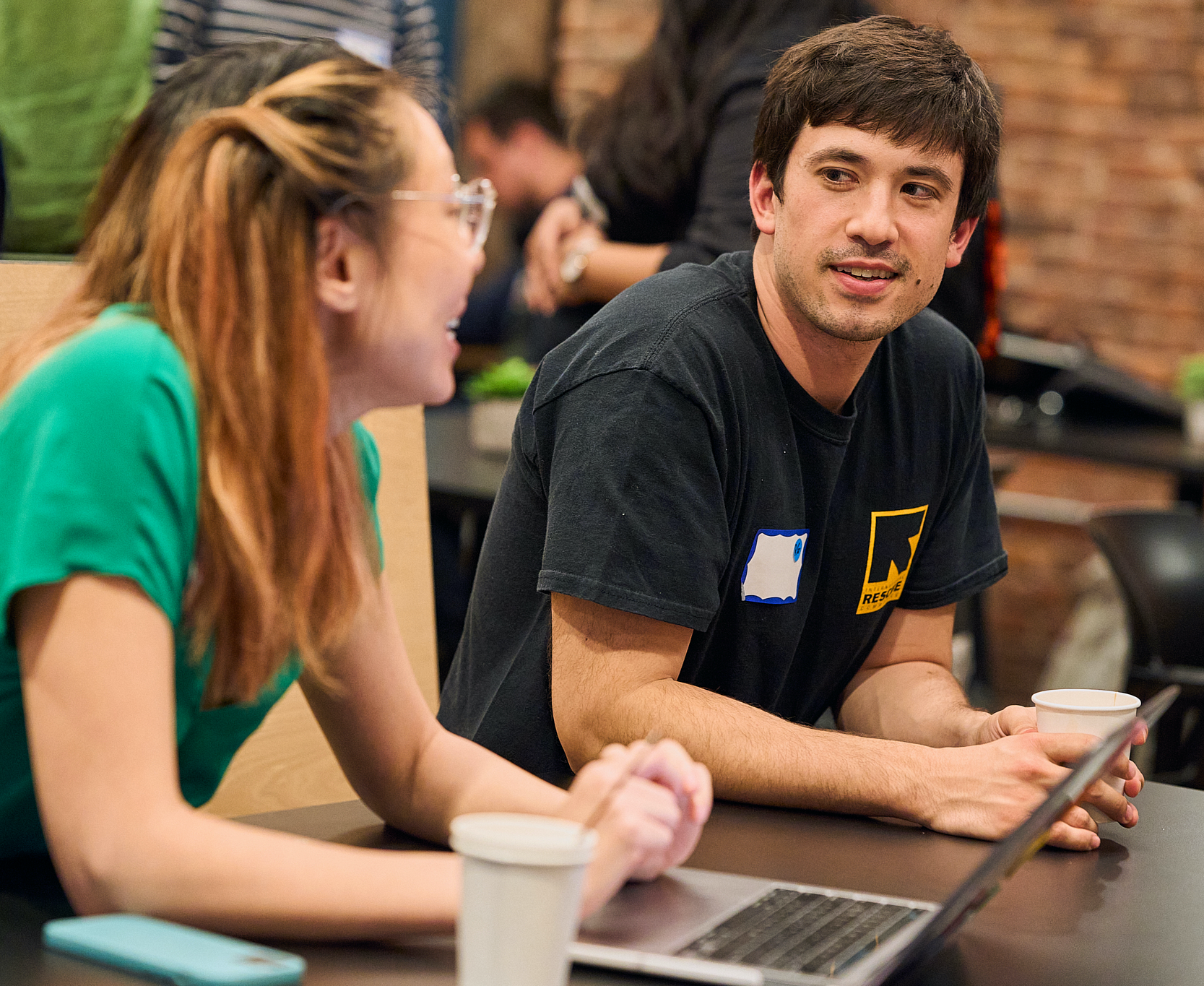 Developers chatting over coffee
